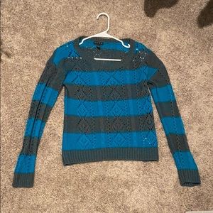 Gary and teal sweater